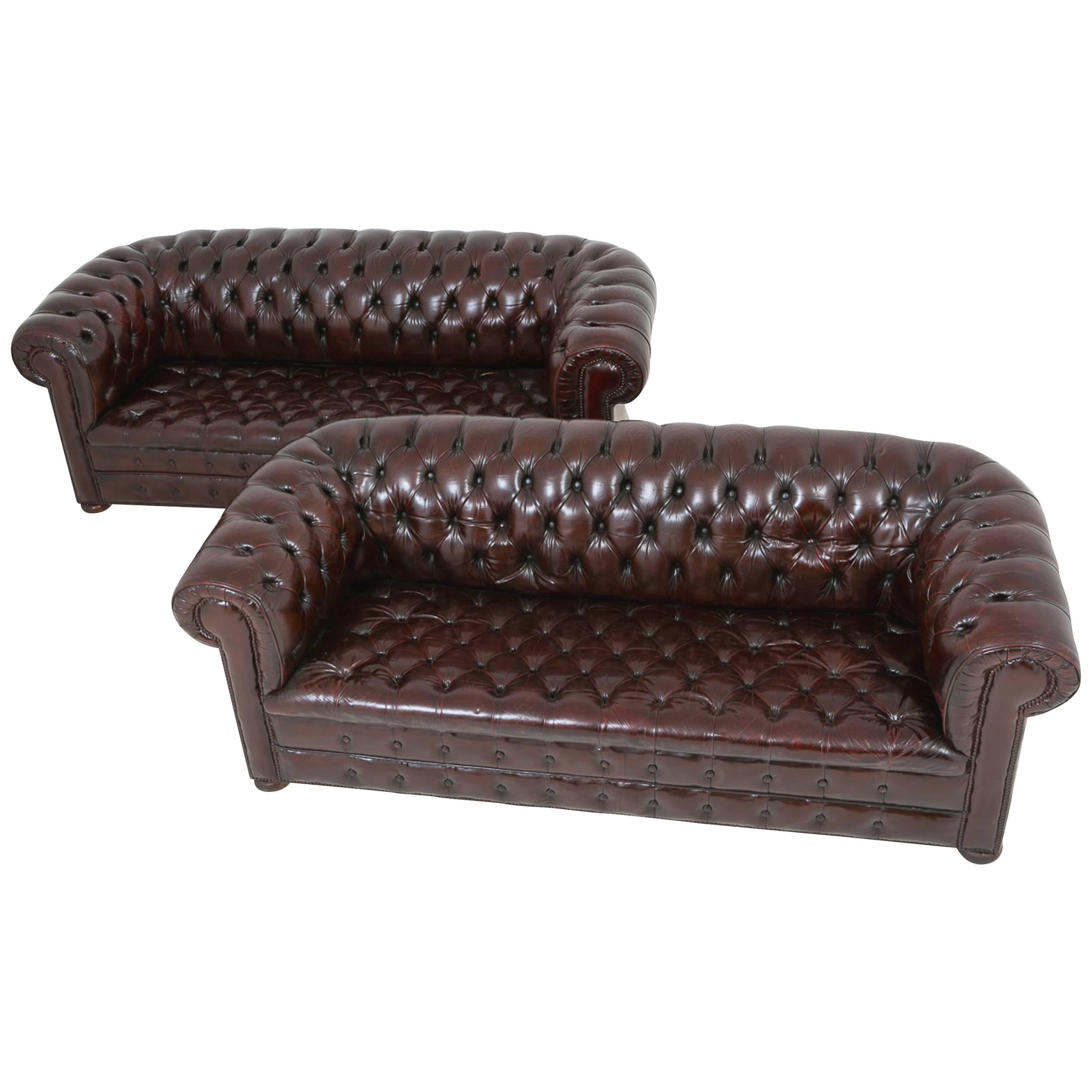 Pair of Deep Buttoned Leather Chesterfields For Sale
