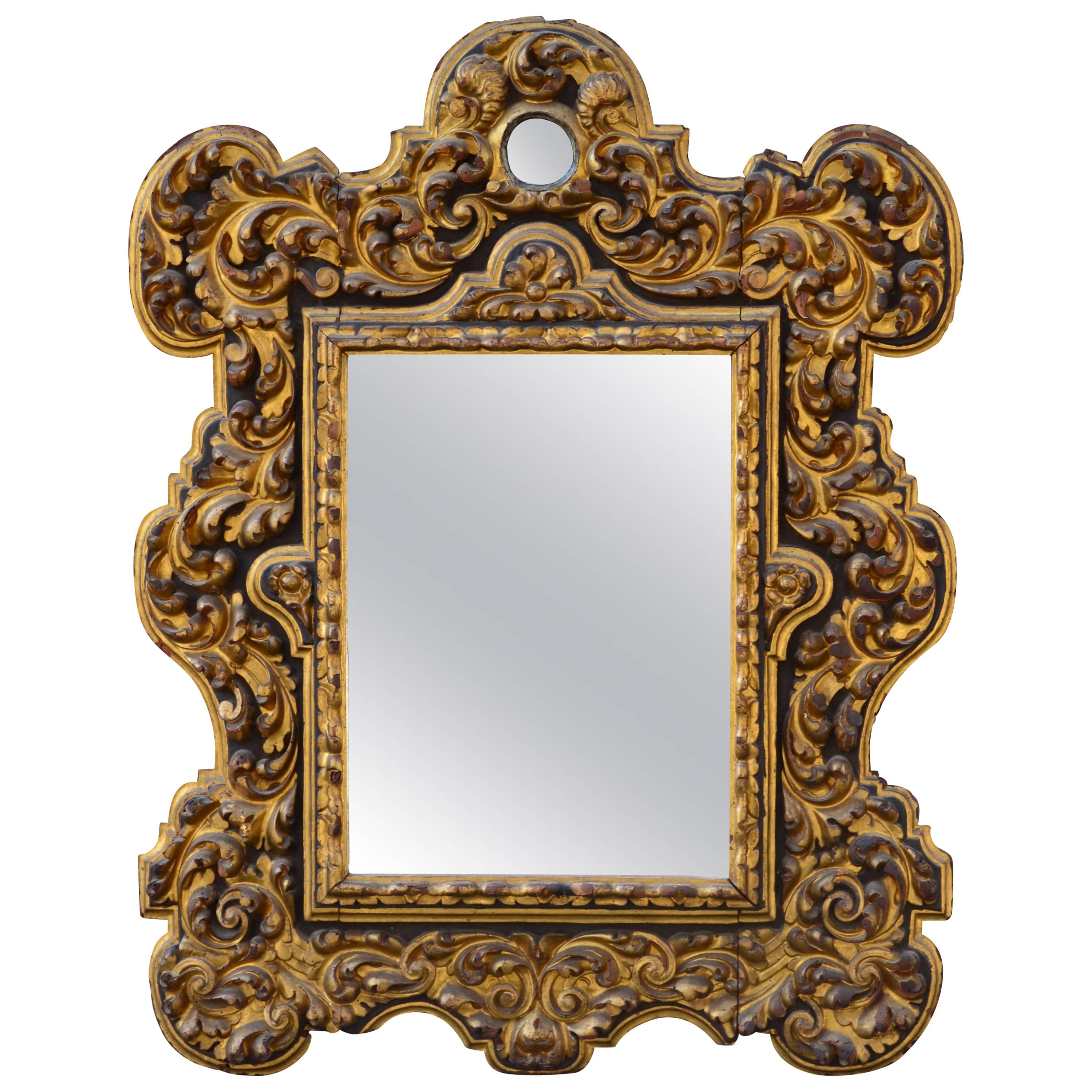 18th Century Mirror in Carved Giltwood