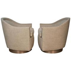 Pair of Mid-Century Modern Swivel Lounge Chairs