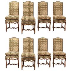 Set di otto sedie da pranzo italiane in noce e imbottite, XX secolo