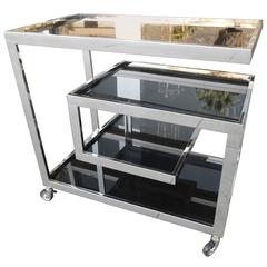 Modern and Chic Chrome and Glass Bar Cart on Wheels