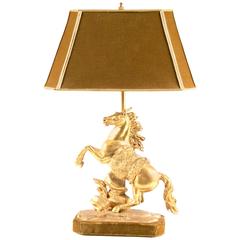 Lampe de table figurative cheval marbré en bronze doré