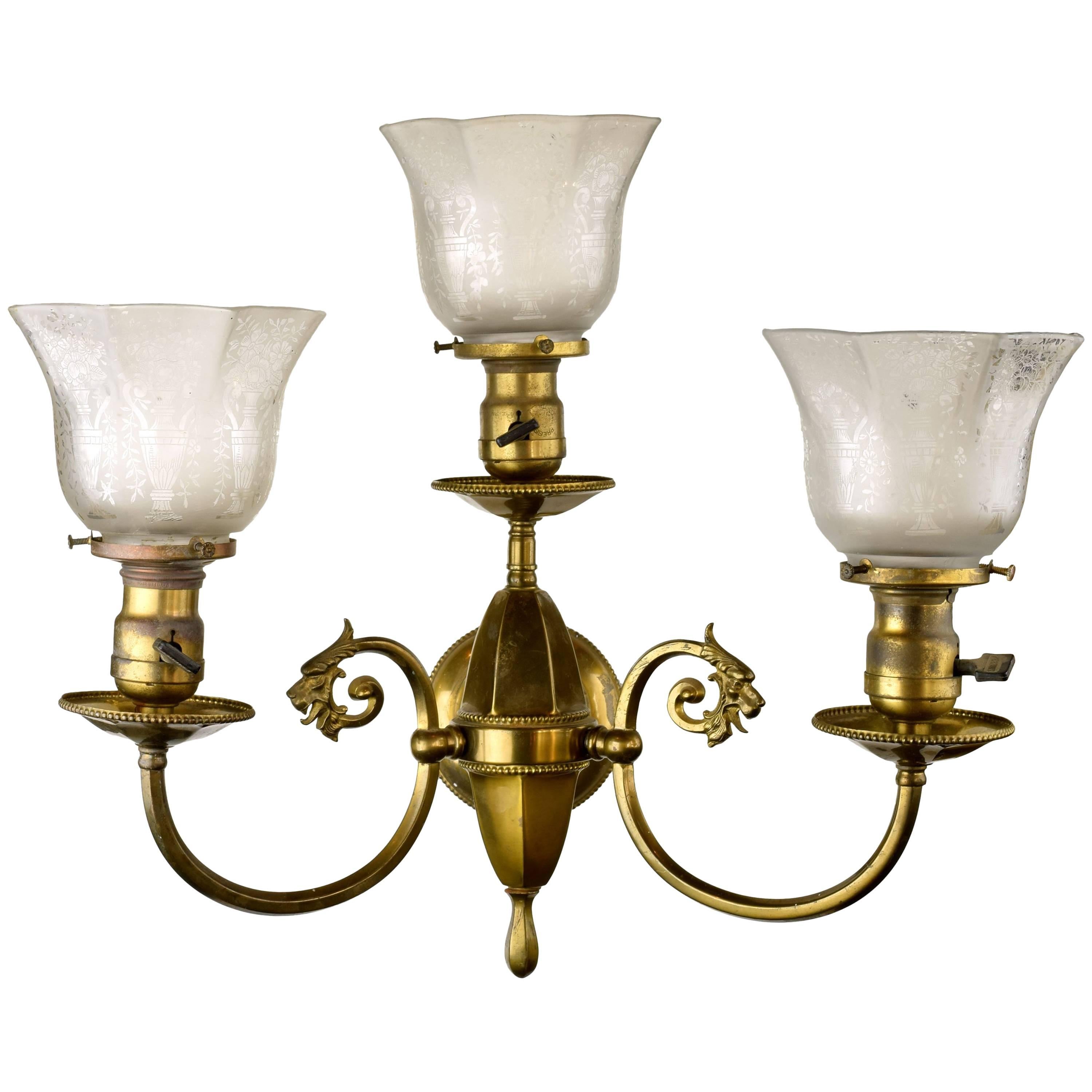 Beardslee Griffin Three-Arm Brass Sconce with shades