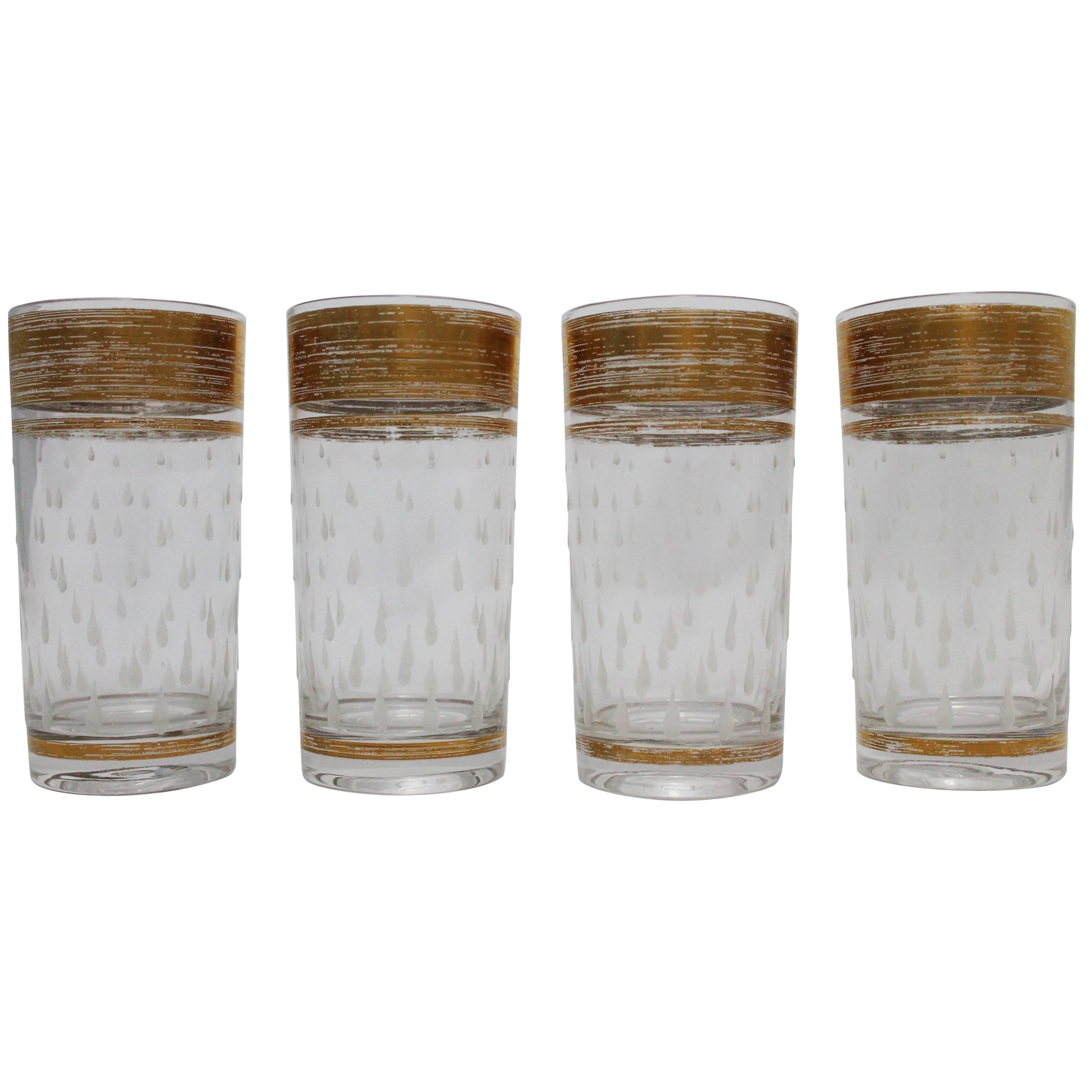 Four Mid-Century Hollywood Regency Glass Tumblers with Gold Trim and Teardrops