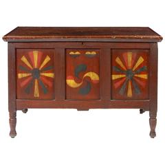 Red-Painted and Polychrome-Decorated Panelled Blanket Chest