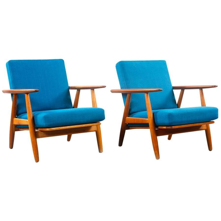 Hans Wegner 1960 famous “Cigar” GE 240 armchairs in Teak and Fabric For Sale