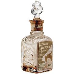 Antique F. Millot, "Héliotrope", an Art Nouveau Molded Glass Perfume Bottle