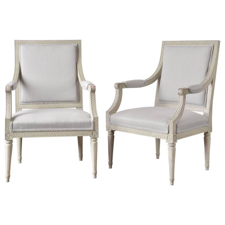 Richly Carved Gustavian Style Pair of Armchairs in Light Blue Linen at