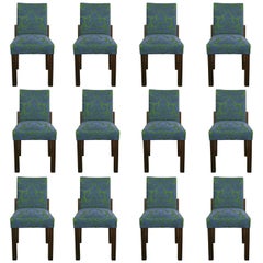 Set of Twelve Dining Room Chairs by Jacques Adnet