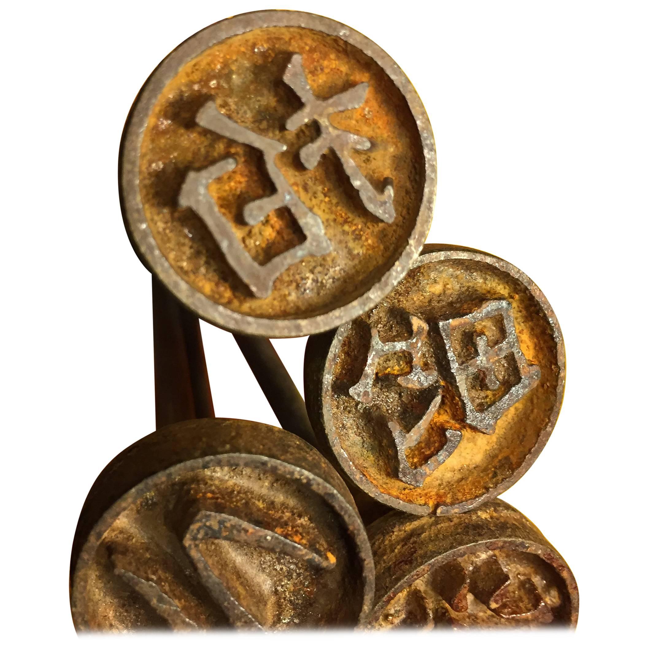 Japan an unusual antique hand-wrought iron metal stamps collection of five (5) 19th century stamps Hanko used to mark and burn their individual design into wooden objects such as boxes. 

Seldom available. We acquired our group recently from a Kyoto