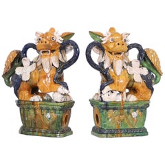 Pair of Early 20th Century Majolica Foo Dogs