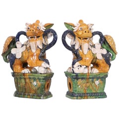 Pair of Early 20th Century Majolica Foo Dogs