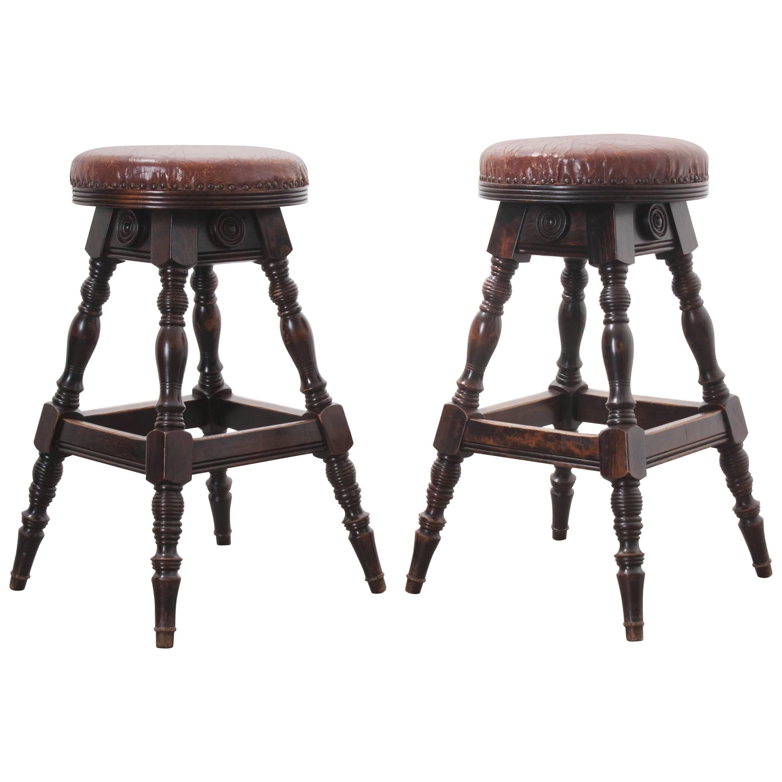 Pair of Late 19th Century English Oak Leather Top Pub Stools