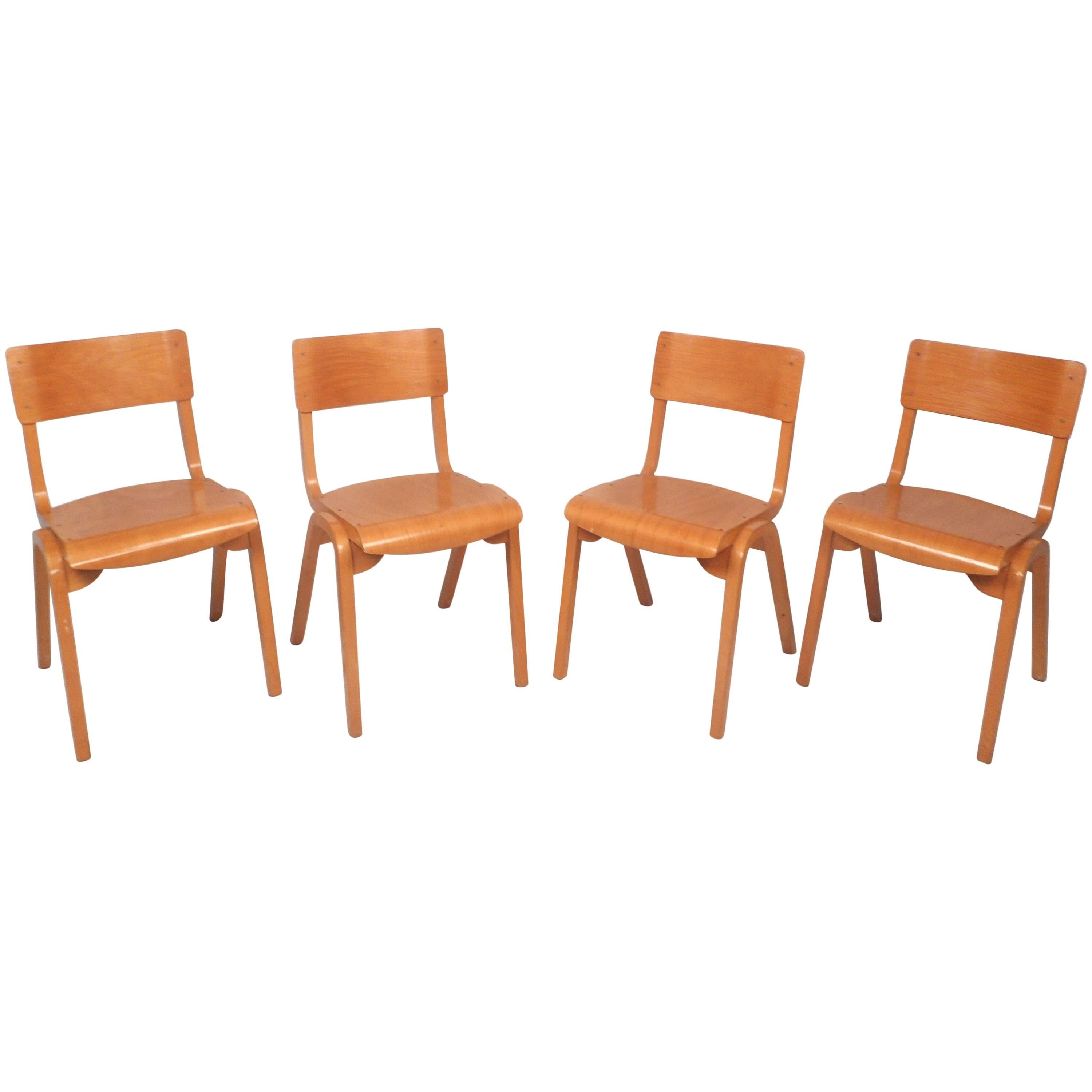 Set of Four Mid-Century Modern Maple Stacking Chairs