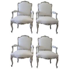 Set of Four Antique Rococo Style Painted and Upholstered Linen Armchairs