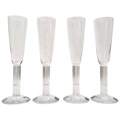 Set von vier Baccarat-Kristall-Champagnerflöten „Lyra“ aus Frankreich