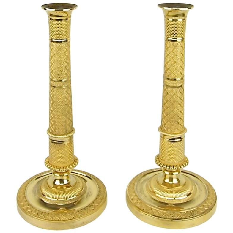Pair of Gilt-Bronze Empire Candlesticks