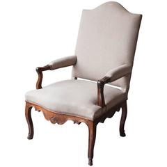 18th Century French Regence Walnut Fauteuil Upholstered in Linen