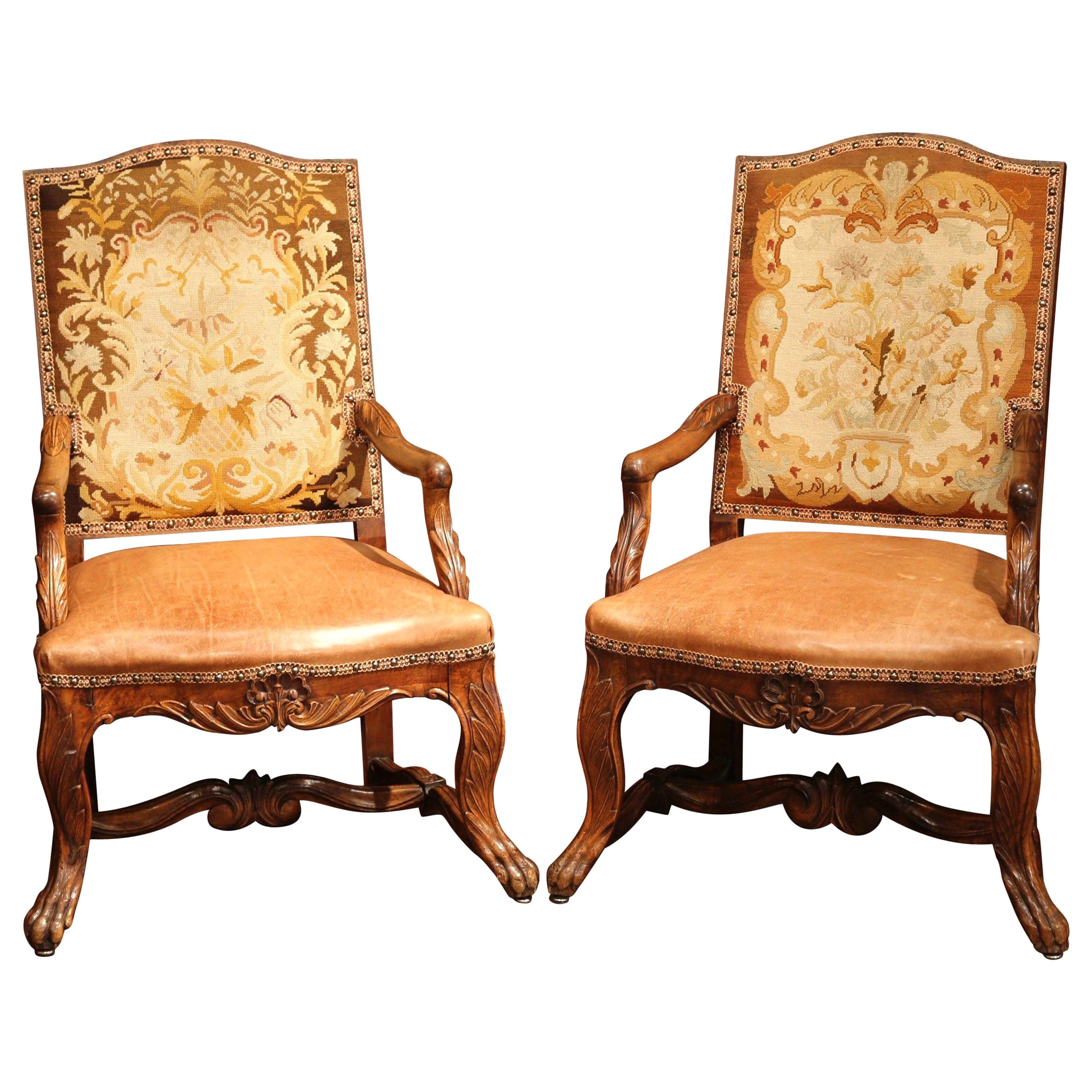 Pair of 18th Century French Carved Walnut, Leather and Needlepoint Armchairs