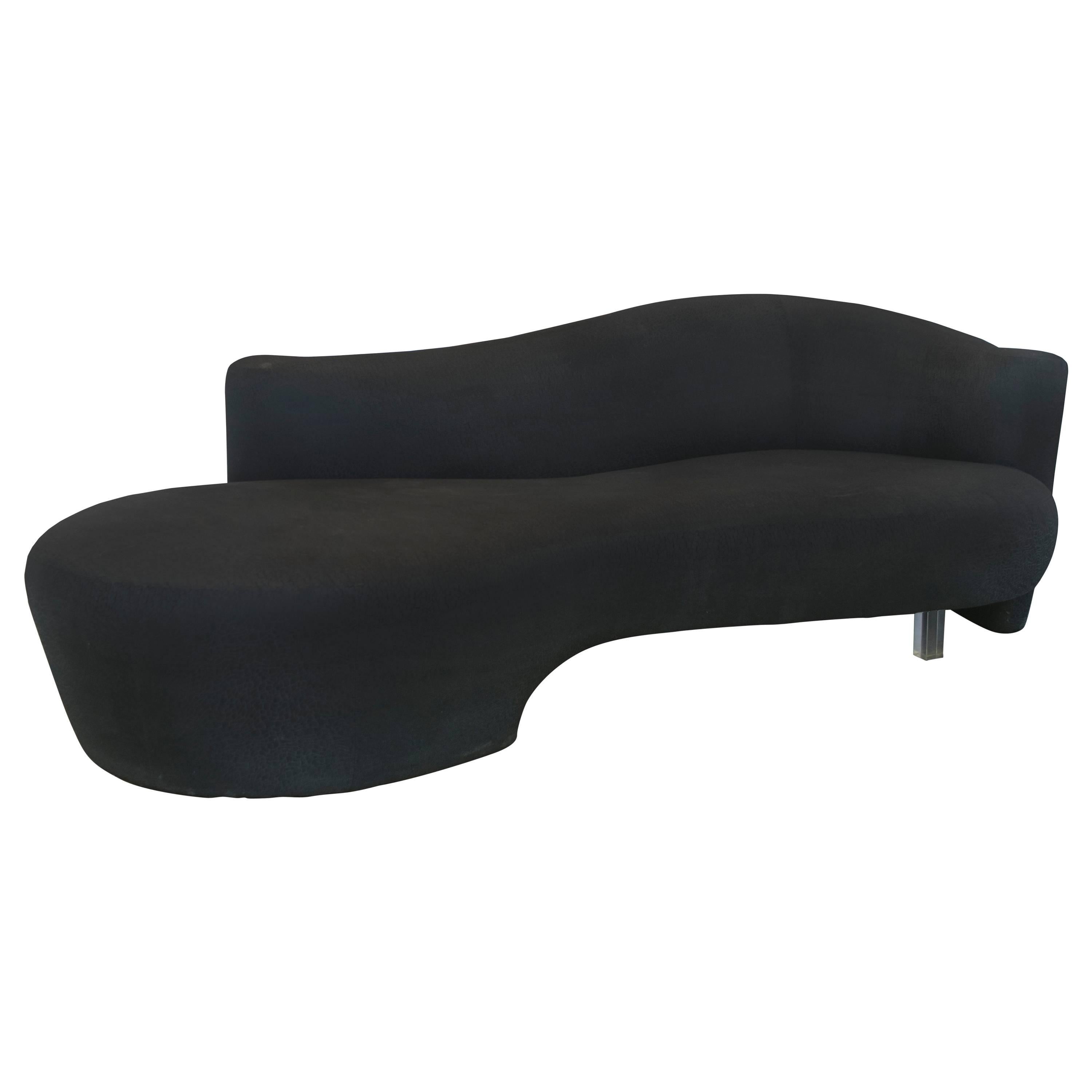 Sensuous Black Serpentine Sofa with Lucite Leg in the Style of Vladimir Kagan For Sale