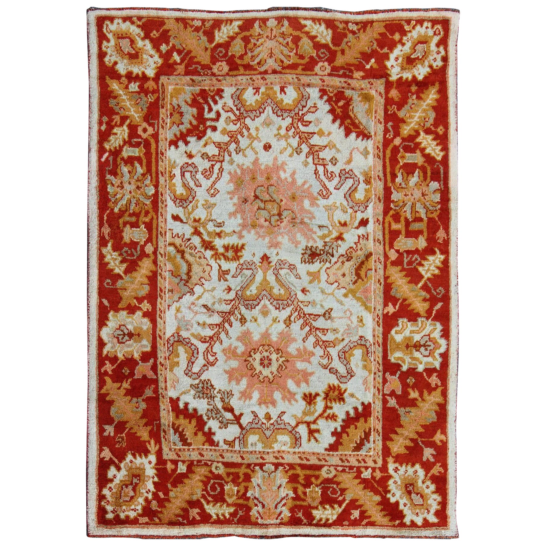 Antique Turkish Oushak with Elegant Motifs in Red, Ivory, Gold and Salmon Pink For Sale