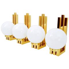 Four Elegant Art Deco Brass and Glass Wall Lights or Sconces