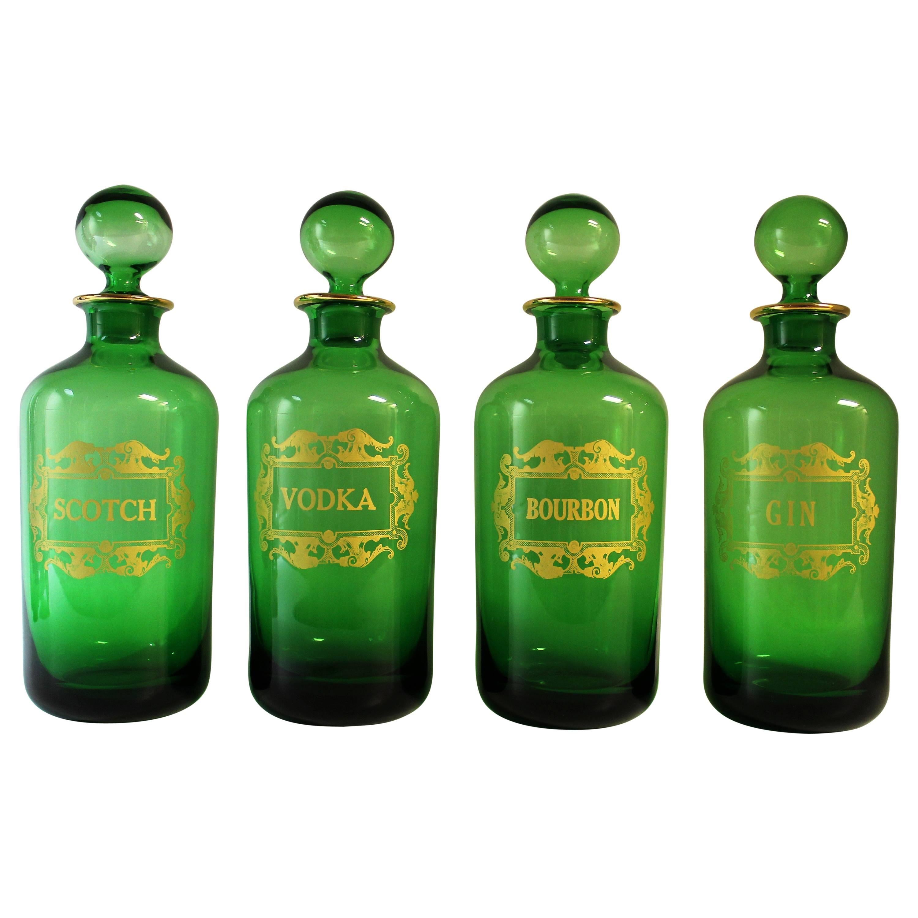 Set of Four French Glass Gilt Liquor Decanter Bottles