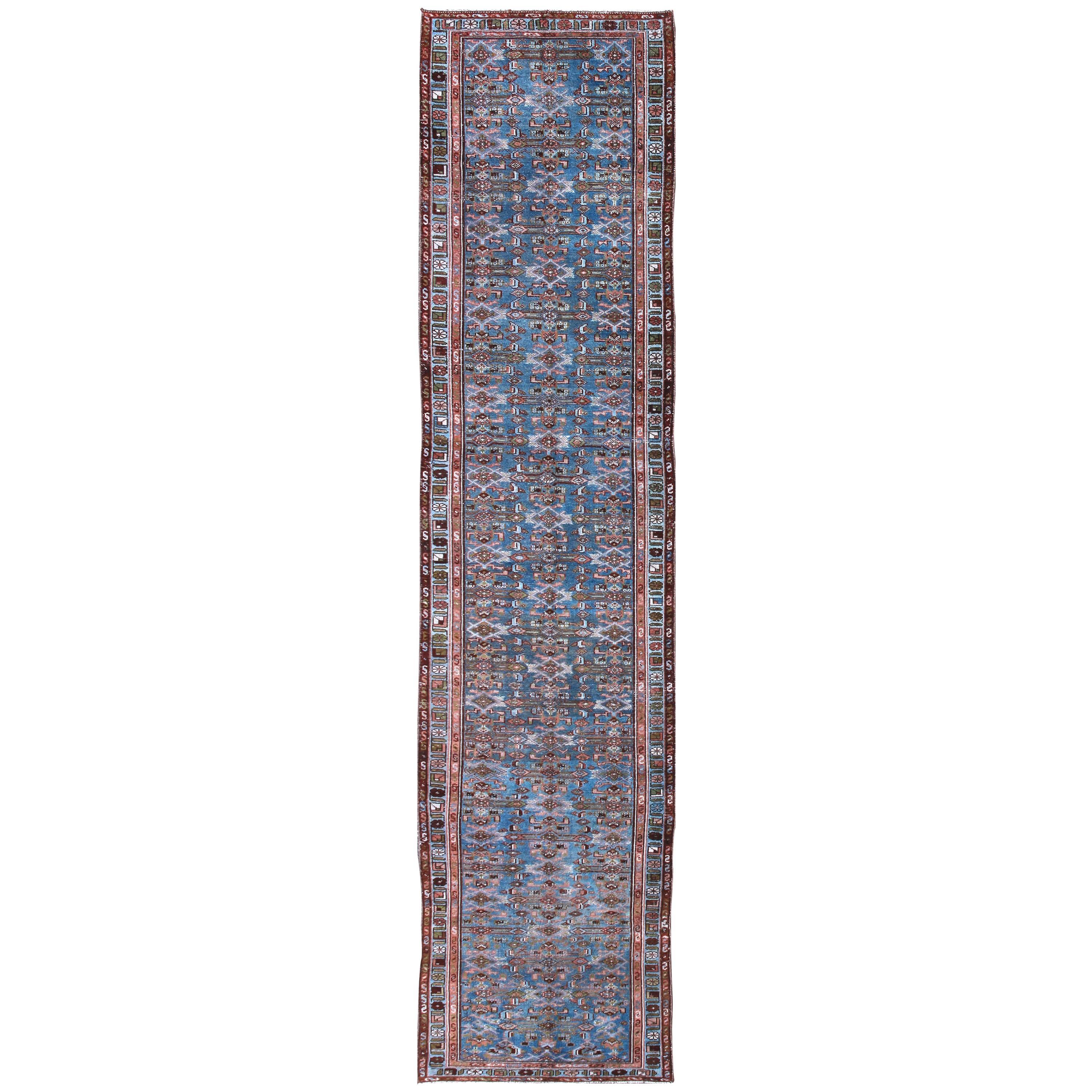 Early 20th Century Long Kurdish Runner with Blue, Red, Green and Salmon Pink For Sale