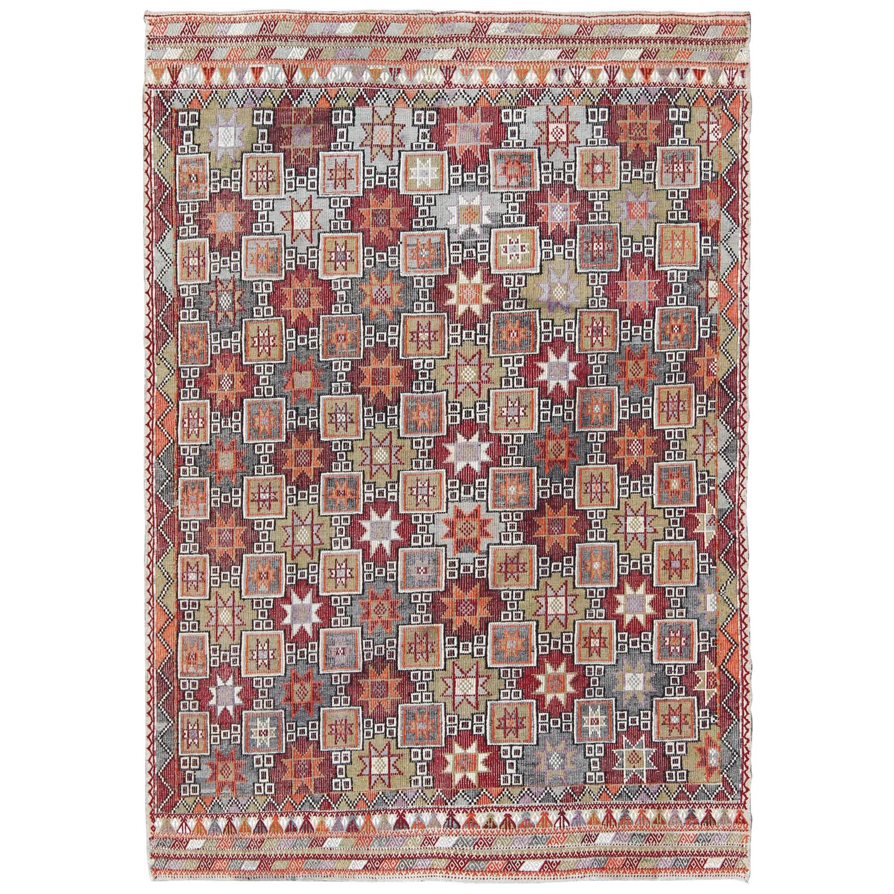 Turkish Vintage Embroidered Kilim Rug With Tribal Star Shapes in Colorful tones For Sale