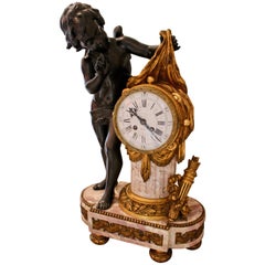 French Louis XVI Period Marble and Gilt-Bronze Mantle Clock with Playful Cupid