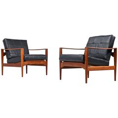 Kai Kristiansen Danish Teak and Black Leather Lounge Chairs Circa 1960's