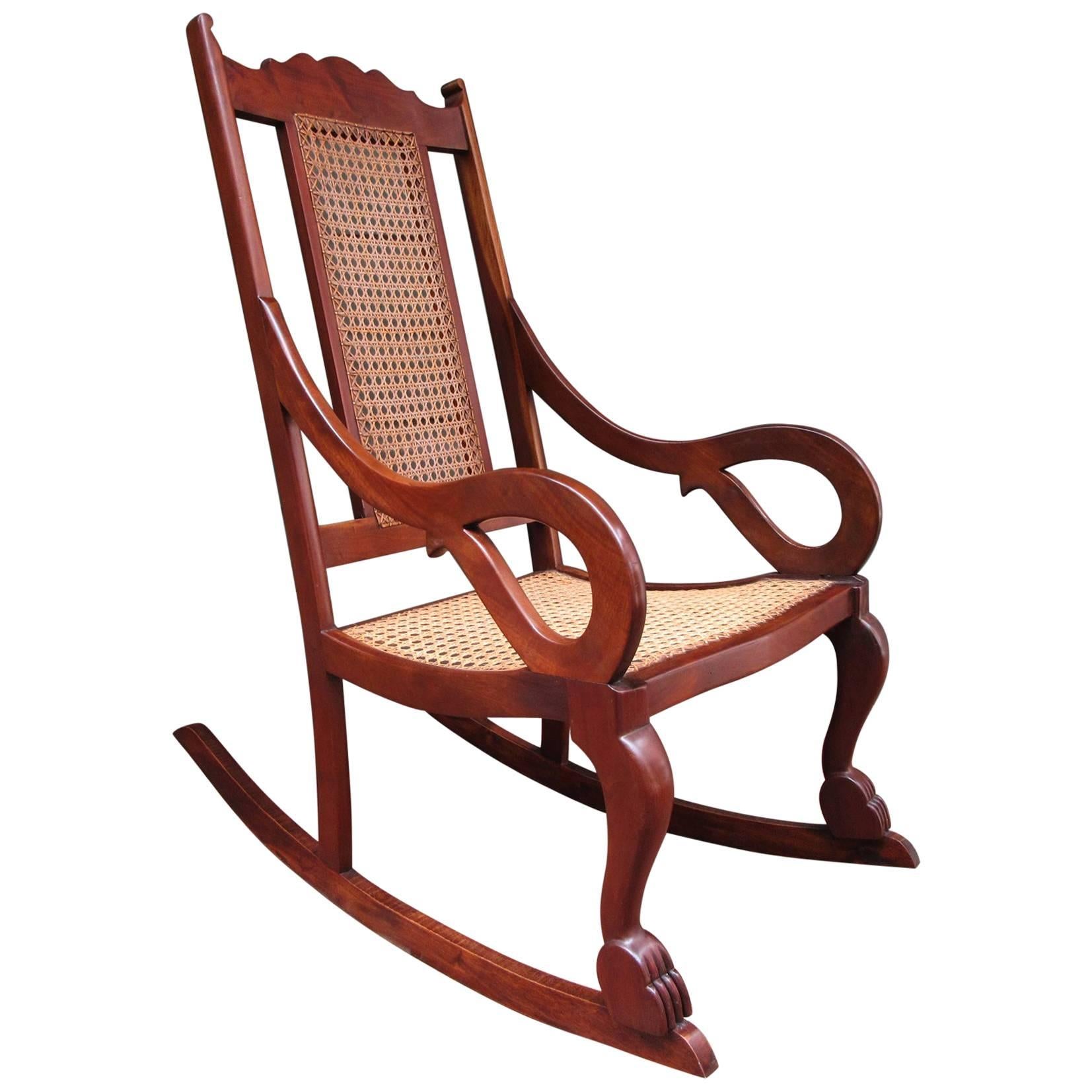 Early 19th Century Caribbean Regency Mahogany and Cane Rocking Chair For Sale