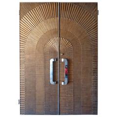Pair of Eclipse Patterned Bonded Bronze Doors by Forms & Surfaces, circa 1970s