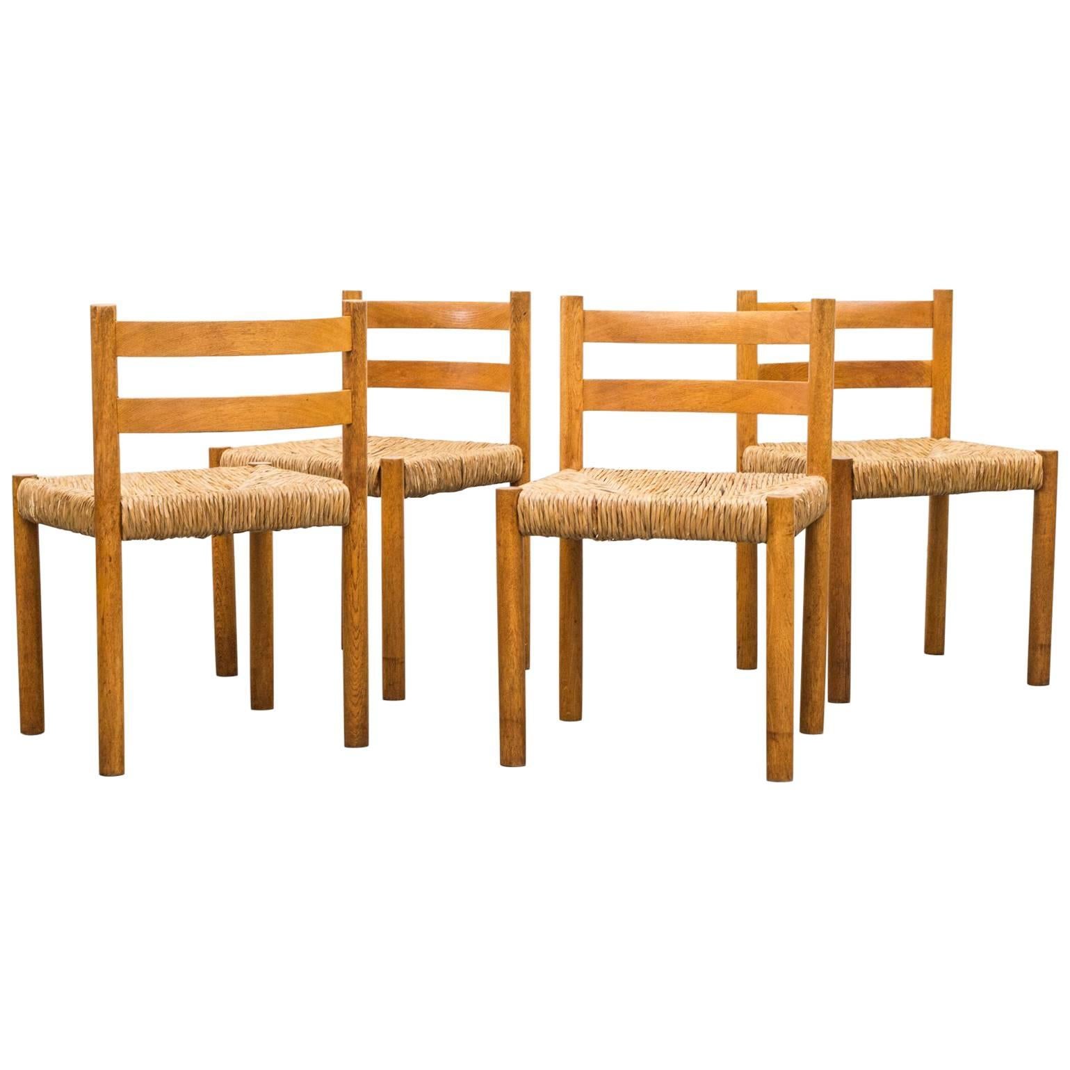 Set of Four Charlotte Perriand Inspired Rush Chairs