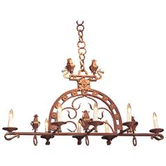 Antique Late 19th Century French Eight-Light Wrought Iron Chandelier with Gilt Accents