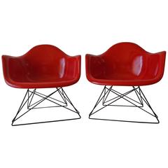 Pair of Charles Eames Herman Miller True Red Armchairs
