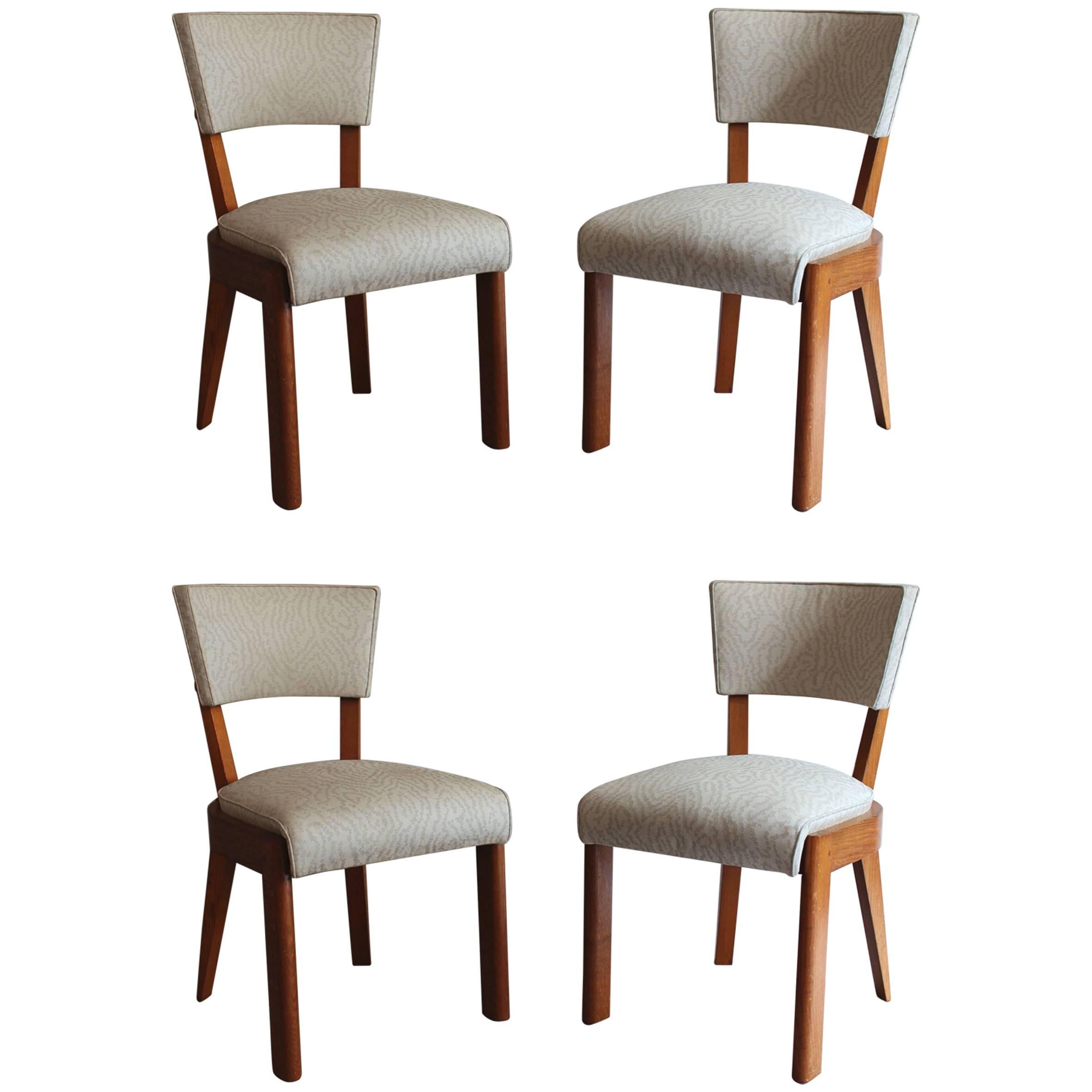 A pair of Fine French Art Deco Oak Chairs by Charles Dudouyt