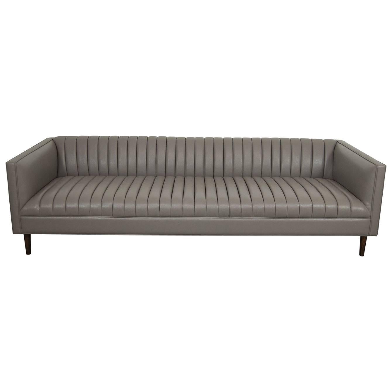 Sofa with Long-Arm Tufting & Walnut Cone Legs in Charcoal Gray Faux Leather For Sale