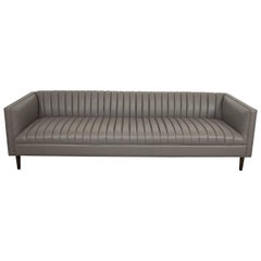 Sofa with Long-Arm Tufting & Walnut Cone Legs in Charcoal Gray Faux Leather