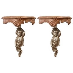 19th Century Pair of Louis XV Style Carved Giltwood Putto Wall Brackets