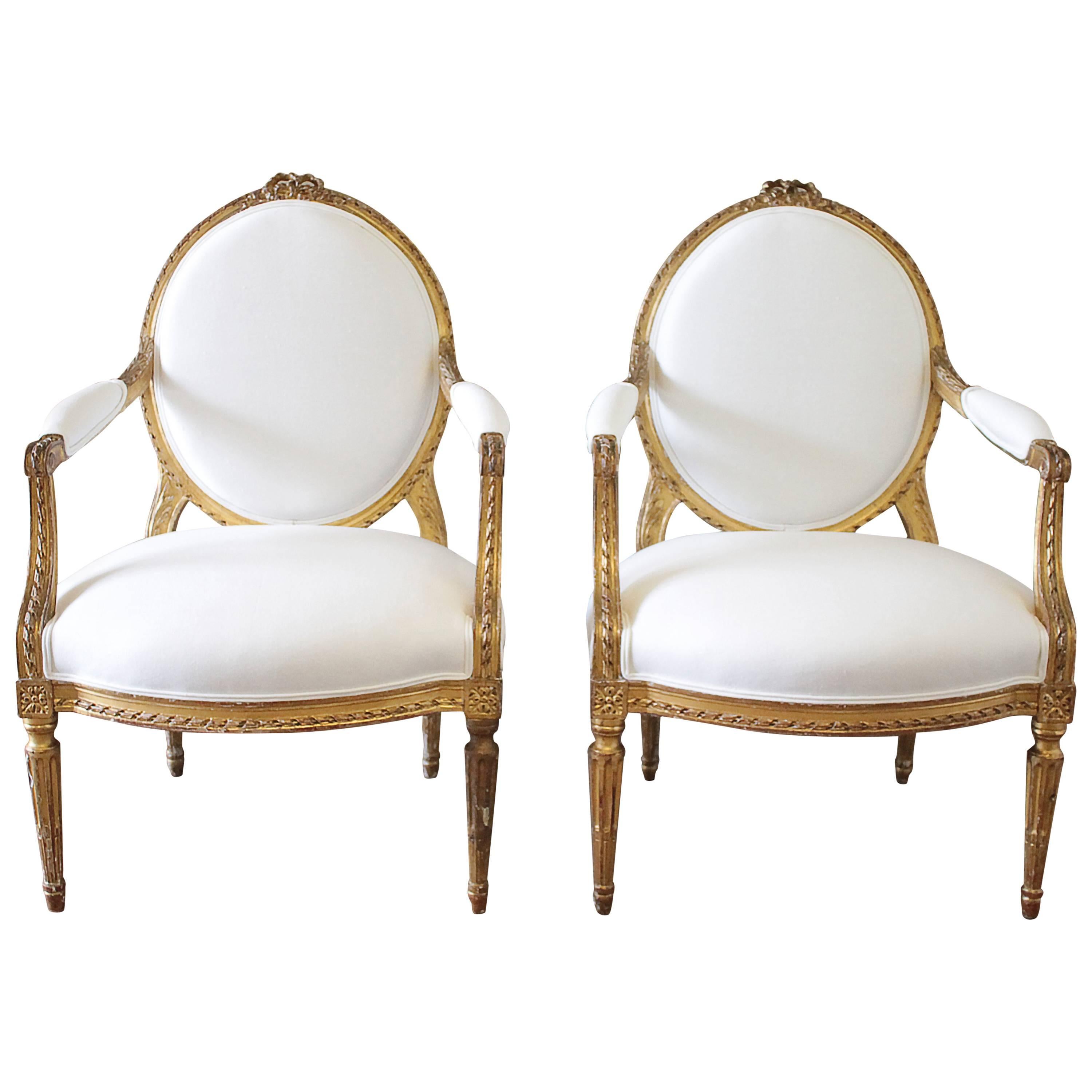 20th Century Carved Giltwood Louis XVI Style Open Armchairs