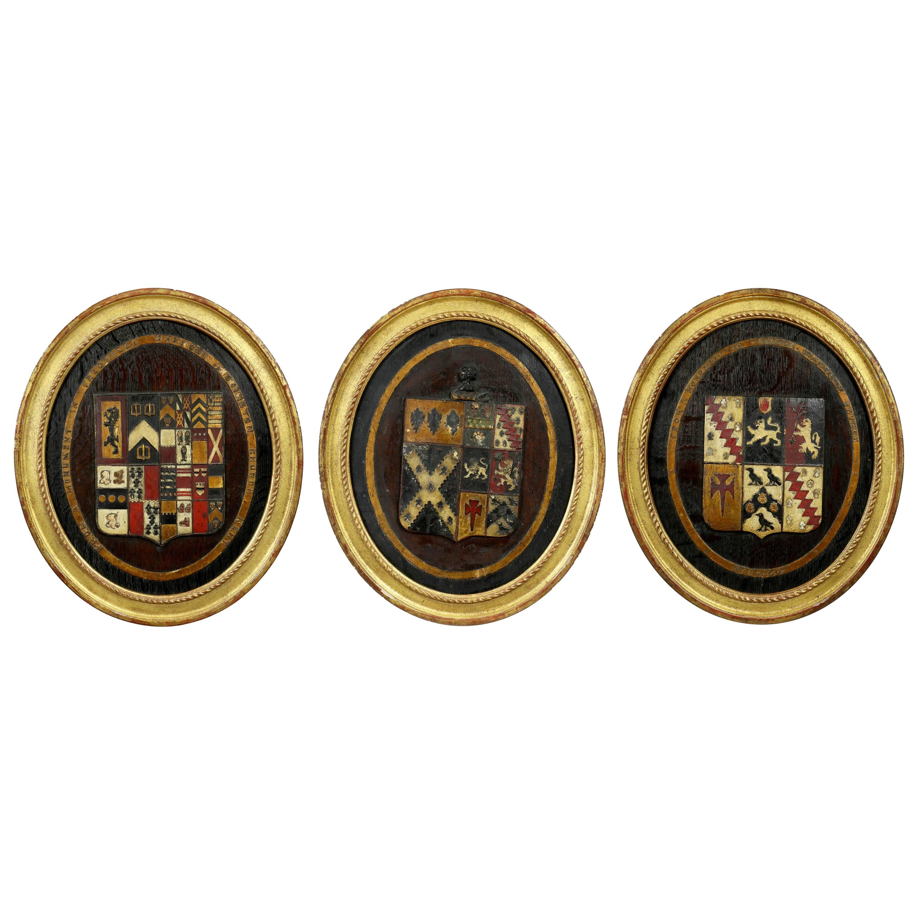 Three British Polychrome Decorated Carved Wood Framed Coats of Arms