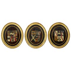 Three British Polychrome Decorated Carved Wood Framed Coats of Arms