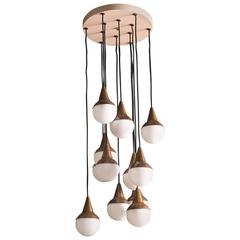 Italian Chandelier with 12 Hanging Opaque Glass Balls and Brass Accents, 1950s 11