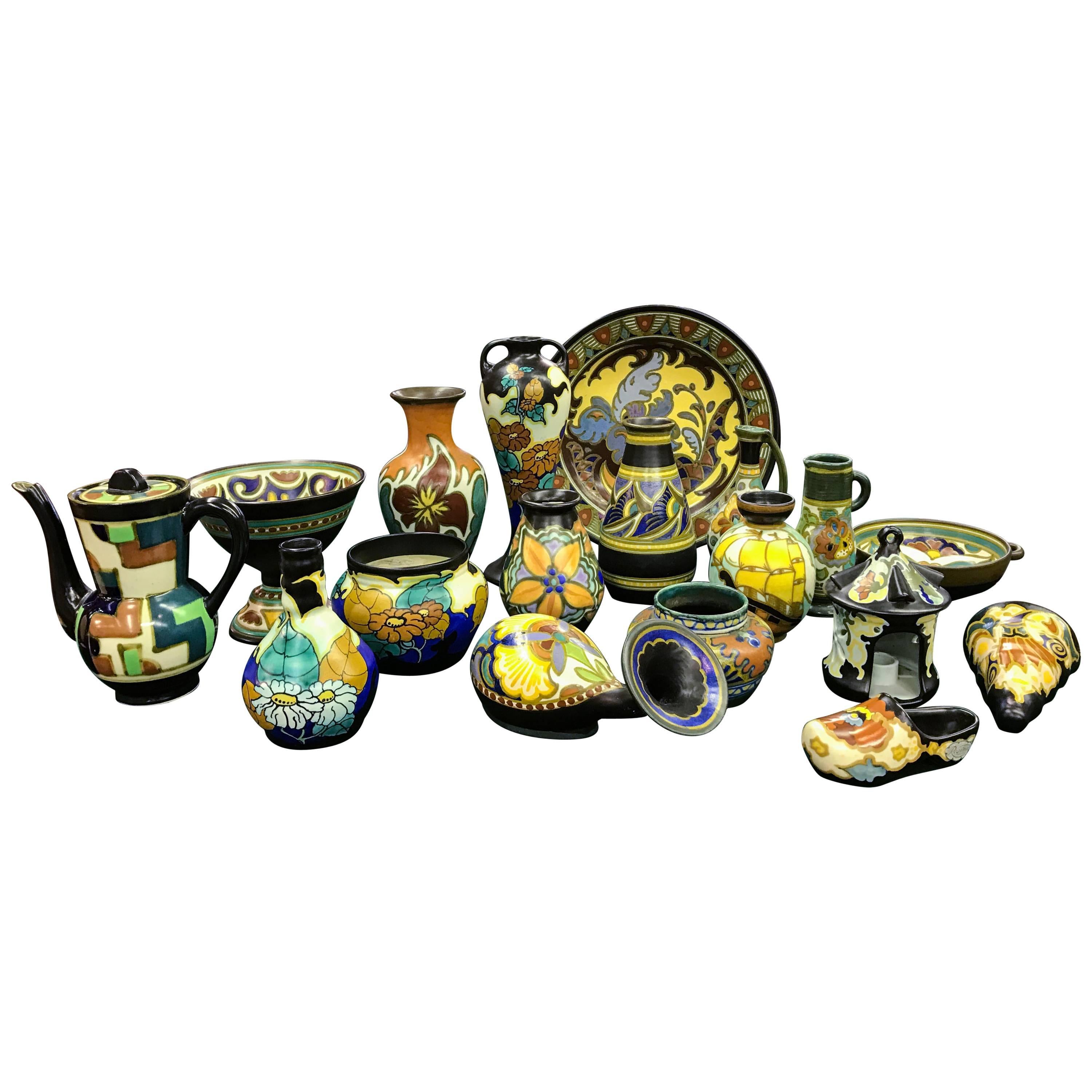 18-Piece Collection of Signed Gouda Pottery For Sale
