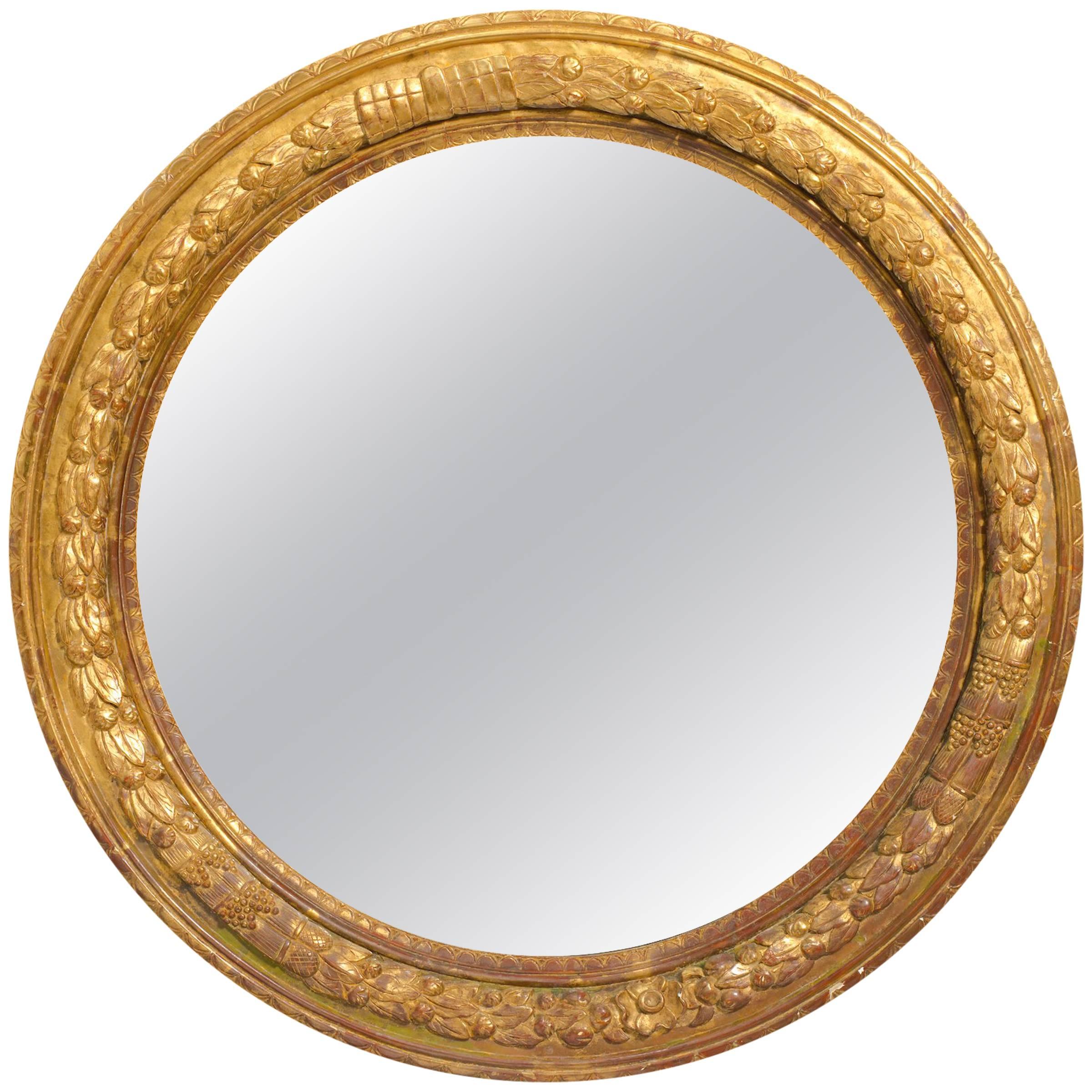 Large Round Carved Giltwood Mirror