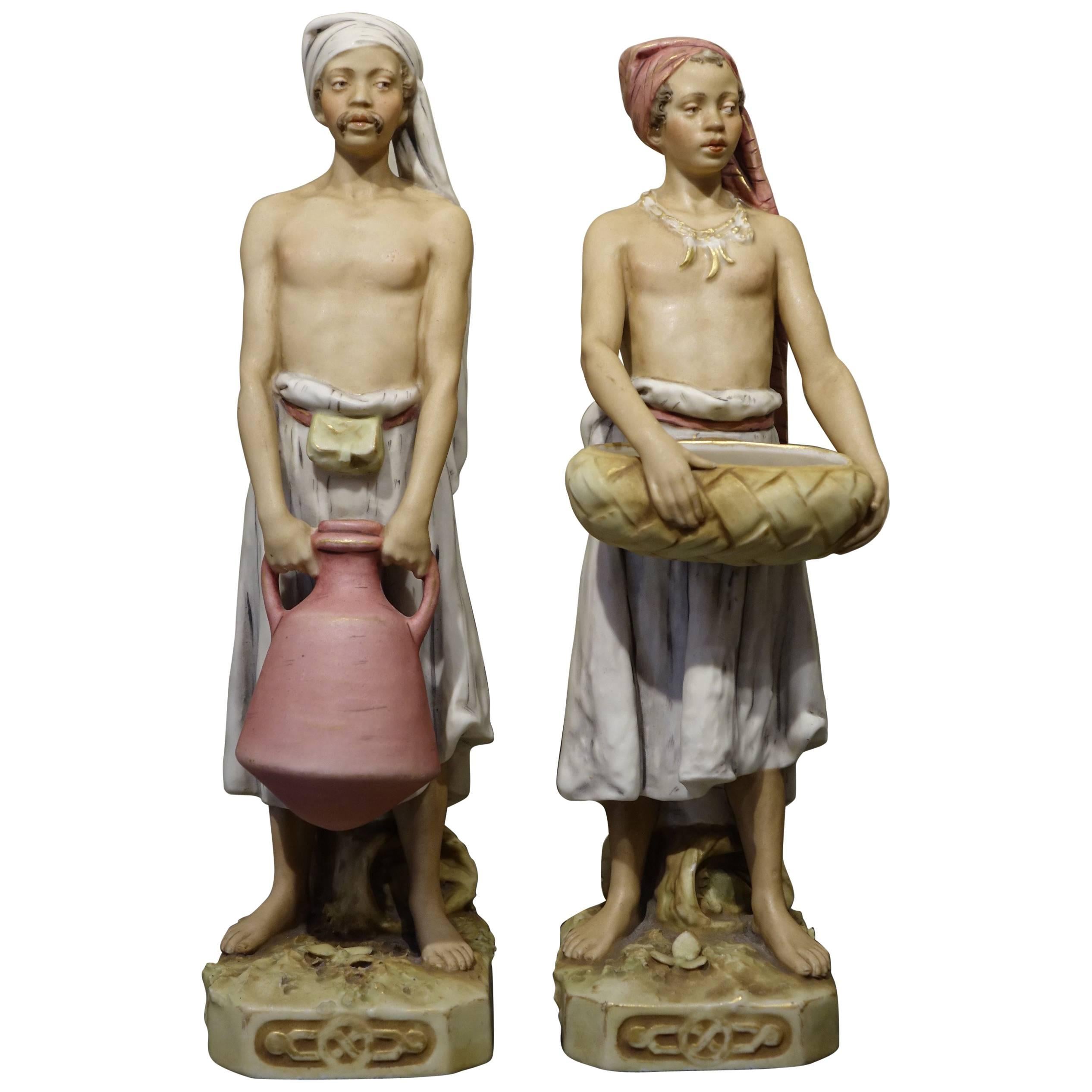 Pair of Royal Dux Bisque Porcelain with Oriental Figures, circa 1900-1910