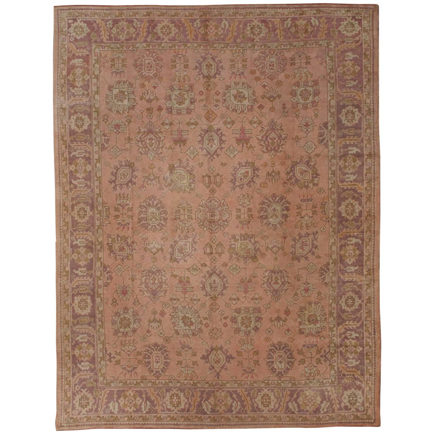 Antique Turkish Oushak Rug with Floral Motifs in Lavender, Coral-Pink, and Green For Sale