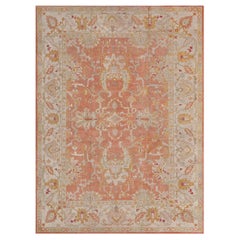 Tapis ancien en laine Oushak rouge et ivoire tissé à la main