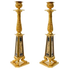 Rare Pair of Gilt-Bronze and Verre Églomisé Candlesticks, Early 19th Century